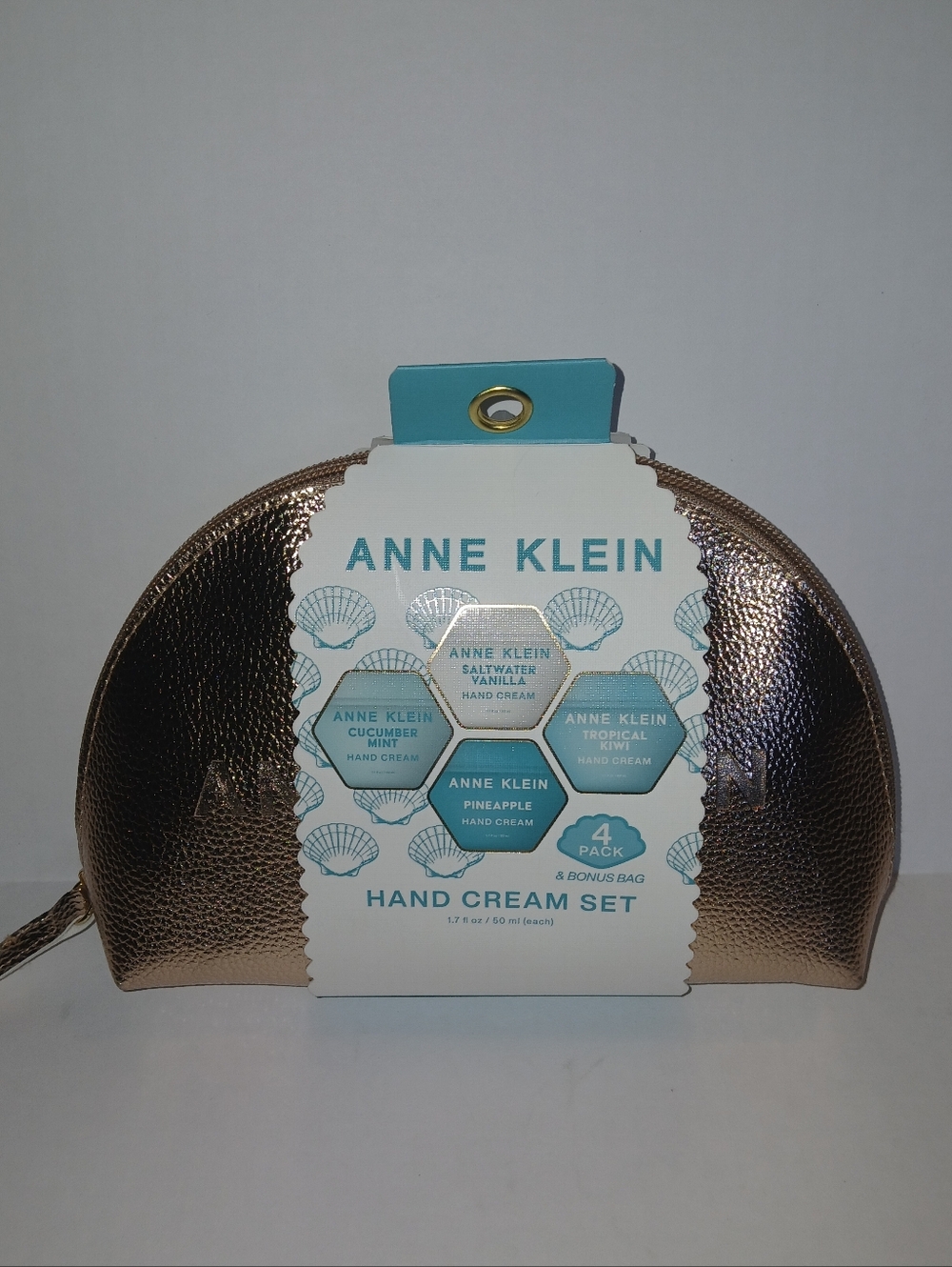 Anne Klein Metallic Gold Cosmetic Bag & 4 Summer Scents Hand Creams 2026